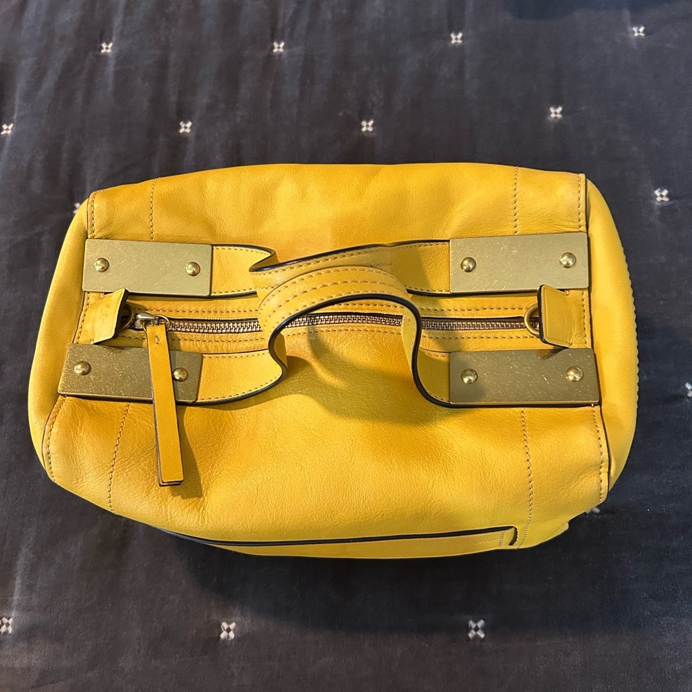 Tory Burch sunshine yellow RARE bag. In excellent pre owned condition.